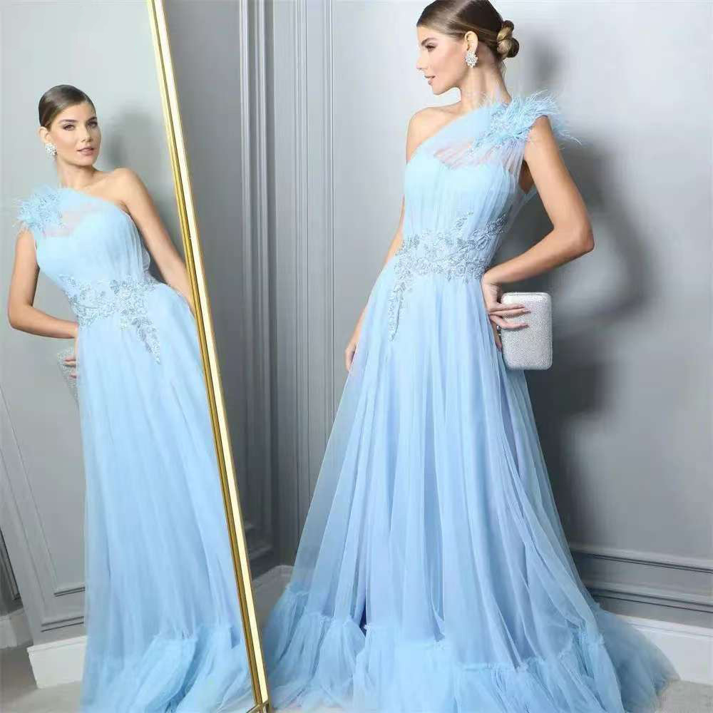 b3ea942b-d8b2-4026-8cc4-f9b95936e491.jpg Blue One-shoulder Feather Wedding Dress - Image 1