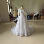 Embroidered Long Sleeve Trailing Wedding Dress - Image 6